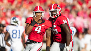 Nolan Smith celebrates after a play during a game between Kentucky Wildcats and Georgia Bulldogs at Sanford Stadium on October 16, 2021 in Athens, Georgia. (Photo by Steven Limentani/ISI Photos/Getty Images)