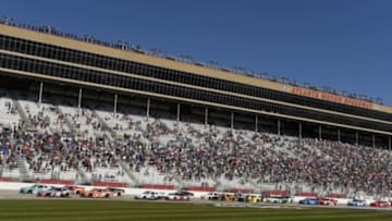 Feb 27, 2016; Hampton, GA, USA; NASCAR Xfinity Series driver Kyle Busch (18) and Erik Jones (20) lead a pack of cars during the Head Up Georgia 250 at Atlanta Motor Speedway. Mandatory Credit: John David Mercer-USA TODAY Sports