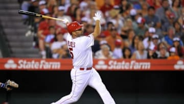 July 5, 2014; Anaheim, CA, USA; Los Angeles Angels first baseman Albert Pujols (5) hits a two run home run in the seventh inning against the Houston Astros at Angel Stadium of Anaheim. Mandatory Credit: Gary A. Vasquez-USA TODAY Sports