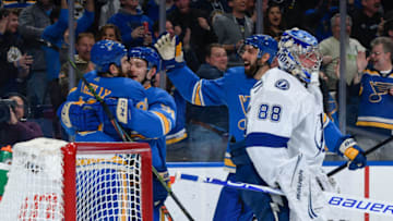 ST. LOUIS, MO - MARCH 23: Vladimir Tarasenko #91 of the St. Louis Blues is congratulated after scoring a goal against the Tampa Bay Lightning at Enterprise Center on March 23, 2019 in St. Louis, Missouri. (Photo by Scott Rovak/NHLI via Getty Images)