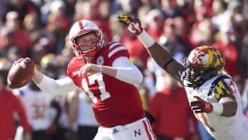 Nov 19, 2016; Lincoln, NE, USA; Nebraska Cornhuskers quarterback Ryker Fyfe (17) attempts to throw the ball as Maryland Terrapins defensive lineman Jesse Aniebonam (41) defends in the first half at Memorial Stadium. Mandatory Credit: Bruce Thorson-USA TODAY Sports