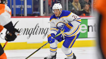 Apr 1, 2023; Philadelphia, Pennsylvania, USA; Buffalo Sabres right wing Kyle Okposo (21) against the Philadelphia Flyers at Wells Fargo Center. Mandatory Credit: Eric Hartline-USA TODAY Sports