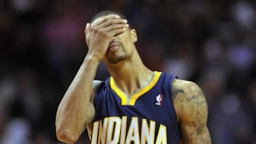 Apr 11, 2014; Miami, FL, USA; Indiana Pacers guard George Hill (3) reacts during the second half against the Miami Heat at American Airlines Arena. Miami won 98-86. Mandatory Credit: Steve Mitchell-USA TODAY Sports