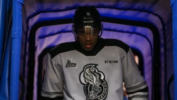 KITCHENER, ONTARIO - MARCH 23: Noah Warren #6 of Team White walks to the locker room prior to the 2022 CHL/NHL Top Prospects Game at Kitchener Memorial Auditorium on March 23, 2022 in Kitchener, Ontario. (Photo by Chris Tanouye/Getty Images)
