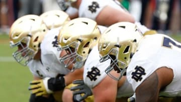Sep 12, 2015; Charlottesville, VA, USA; The Notre Dame Fighting Irish offensive line lines up against the Virginia Cavaliers at Scott Stadium. Mandatory Credit: Geoff Burke-USA TODAY Sports