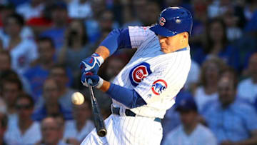 Jun 21, 2016; Chicago, IL, USA; Chicago Cubs first baseman Anthony Rizzo (44) hits a sac fly during the first inning against the St. Louis Cardinals at Wrigley Field. Mandatory Credit: Caylor Arnold-USA TODAY Sports