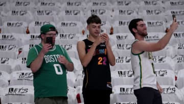 MIAMI, FLORIDA - MAY 25: Fans take pictures with their cellphones prior to Game Five between the Boston Celtics and the Miami Heat in the 2022 NBA Playoffs Eastern Conference Finals at FTX Arena on May 25, 2022 in Miami, Florida. NOTE TO USER: User expressly acknowledges and agrees that, by downloading and or using this photograph, User is consenting to the terms and conditions of the Getty Images License Agreement. (Photo by Eric Espada/Getty Images)