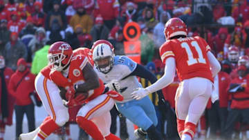 Dec 18, 2016; Kansas City, MO, USA; Kansas City Chiefs quarterback Alex Smith (11) hands off to wide receiver Tyreek Hill (10) to score a touchdown during the first half against the Tennessee Titans at Arrowhead Stadium. Mandatory Credit: Denny Medley-USA TODAY Sports