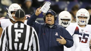 Oct 31, 2015; Seattle, WA, USA; Arizona Wildcats head coach Rich Rodriguez disputes a call in the third quarter against the against the Washington Huskies at Husky Stadium. Mandatory Credit: Jennifer Buchanan-USA TODAY Sports