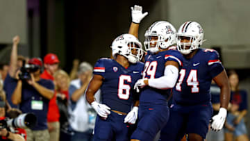 Sep 10, 2022; Tucson, Arizona, USA; Arizona Wildcats running back Michael Wiley (6) celebrates after scoring a touchdown during the first quarter against the Mississippi State Bulldogs at Arizona Stadium. Mandatory Credit: Mark J. Rebilas-USA TODAY Sports