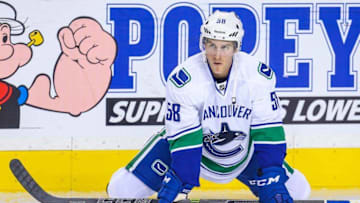 Sep 25, 2015; Calgary, Alberta, CAN; Vancouver Canucks defenseman Taylor Fedun (58) during the warmup period against the Calgary Flames at Scotiabank Saddledome. Mandatory Credit: Sergei Belski-USA TODAY Sports