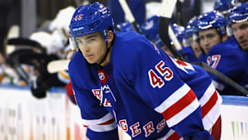 NEW YORK, NEW YORK - SEPTEMBER 28: Braden Schneider #45 of the New York Rangers skates against the Boston Bruins at Madison Square Garden on September 28, 2021 in New York City. (Photo by Bruce Bennett/Getty Images)