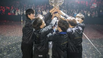 SKT holding the Season 6 Summoner's Cup, courtesy of Riot Games