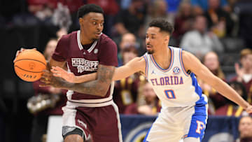 Mar 9, 2023; Nashville, TN, USA; Florida Gators guard Myreon Jones (0) moves in for the ball from Mississippi State Bulldogs forward D.J. Jeffries (0) during the second half at Bridgestone Arena. Mandatory Credit: Steve Roberts-USA TODAY Sports