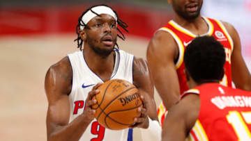 Detroit Pistons forward Jerami Grant (9) holds the ball while defended by Atlanta Hawks forward Onyeka Okongwu Credit: Raj Mehta-USA TODAY Sports