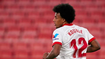 SEVILLE, SPAIN - MAY 23: Jules Kounde of Sevilla FC looks on during the La Liga Santander match between Sevilla FC and Deportivo Alavés at Estadio Ramon Sanchez Pizjuan on May 23, 2021 in Seville, Spain. Sporting stadiums around Spain remain under strict restrictions due to the Coronavirus Pandemic as Government social distancing laws prohibit fans inside venues resulting in games being played behind closed doors. (Photo by Mateo Villalba/Quality Sport Images/Getty Images)