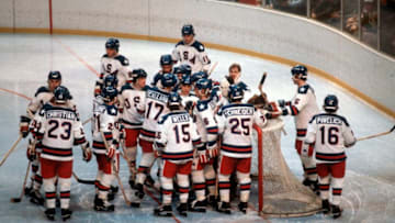LAKE PLACID, NY - FEBRUARY 22: The United States Hockey team celebrates after they defeated the Soviet Union during a metal round game of the Winter Olympics February 22, 1980 at the Olympic Center in Lake Placid, New York. The game was named "The Miracle On Ice" as the United States defeated the Soviet Union 4-3. . (Photo by Focus on Sport/Getty Images) *** Local Caption ***