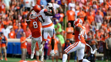 CLEMSON, SC - SEPTEMBER 29: Wide receiver Jamal Custis #17 of the Syracuse Orange makes a long reception over cornerback A.J. Terrell #8 of the Clemson Tigers during the football game at Clemson Memorial Stadium on September 29, 2018 in Clemson, South Carolina. (Photo by Mike Comer/Getty Images)