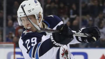 NEW YORK, NEW YORK - DECEMBER 02: Patrik Laine #29 of the Winnipeg Jets takes the first period shot against the New York Rangers at Madison Square Garden on December 02, 2018 in New York City. (Photo by Bruce Bennett/Getty Images)