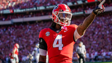 Oct 16, 2021; Athens, Georgia, USA; Georgia Bulldogs running back James Cook (4) reacts after running for a touchdown against the Kentucky Wildcats during the first half at Sanford Stadium. Mandatory Credit: Dale Zanine-USA TODAY Sports