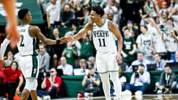 Michigan State's A.J. Hoggard, right, celebrates with Tyson Walker after Walker's 3-pointer against Rutgers during the second half on Thursday, Jan. 19, 2023, at the Breslin Center in East Lansing.230119 Msu Rutgers Bball 158a