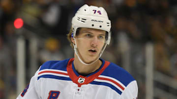 PITTSBURGH, PA - DECEMBER 20: Vitali Kravtsov #74 of the New York Rangers looks on in the third period during the game against the Pittsburgh Penguins at PPG PAINTS Arena on December 20, 2022 in Pittsburgh, Pennsylvania. (Photo by Justin Berl/Getty Images)