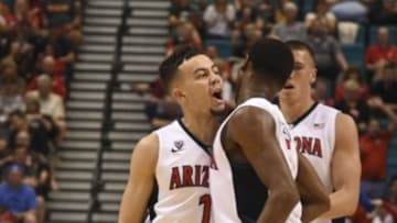 March 10, 2016; Las Vegas, NV, USA; Arizona Wildcats guard Gabe York (1) celebrates with guard Kadeem Allen (5) during the first half of the Pac-12 Conference tournament against the Colorado Buffaloes at MGM Grand Garden Arena. Mandatory Credit: Kyle Terada-USA TODAY Sports