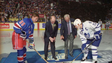 Red Kelly (middle left) and Andy Bathgate drop the puck between Wayne Gretzky #99 of the New York Rangers and Mats Sundin #13 of the Toronto Maple Leafs (Photo by Graig Abel/Getty Images)