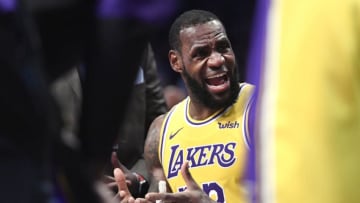 NEW YORK, NEW YORK - DECEMBER 18: LeBron James #23 of the Los Angeles Lakers reacts during a timeout in the fourth quarter of the game against the Brooklyn Nets at Barclays Center on December 18, 2018 in New York City. NOTE TO USER: User expressly acknowledges and agrees that, by downloading and or using this photograph, User is consenting to the terms and conditions of the Getty Images License Agreement. (Photo by Sarah Stier/Getty Images)