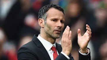 MANCHESTER, ENGLAND - APRIL 26: Ryan Giggs of Manchester United applauds the fans after a rousing victory in his first match as manager during the Barclays Premier League match between Manchester United and Norwich City at Old Trafford on April 26, 2014 in Manchester, England. (Photo by Laurence Griffiths/Getty Images)