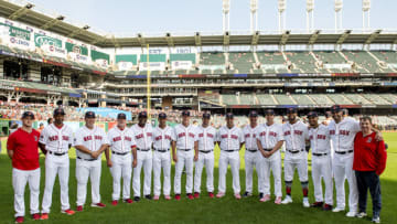 CLEVELAND, OH - JULY 09: Video Coordinator JT Watkins, first base coach Tom Goodwin, bullpen coach Craig Bjornson, pitching coach Dana LeVangie, third base coach Carlos Febles, bullpen catcher Mani Martinez, bench coach Ron Roenicke, coach Ramon Vazquez, manager Alex Cora, assistant hitting coach Andy Barkett, hitting coach Tim Hyers, Xander Bogaerts #2, Mookie Betts #50, J.D. Martinez #28, and video coordinator Billy Broadbent of the Boston Red Sox pose for a group photograph before the 2019 MLB All-Star Game at Progressive Field on July 9, 2019 in Cleveland, Ohio. (Photo by Billie Weiss/Boston Red Sox/Getty Images)