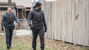 CHICAGO P.D. -- "Chasing Monsters" Episode 513 -- Pictured: (l-r) Patrick John Flueger as Adam Ruzek, LaRoyce Hawkins as Kevin Atwater -- (Photo by: Matt Dinerstein/NBC)