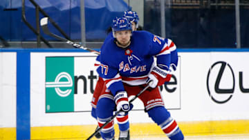 NEW YORK, NEW YORK - JANUARY 14: Tony DeAngelo #77 of the New York Rangers skates against the New York Islanders at Madison Square Garden on January 14, 2021 in New York City. The Islanders defeated the Rangers 4-0. (Photo by Bruce Bennett/Getty Images)
