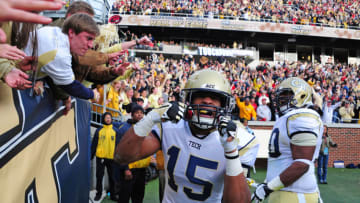 ATLANTA, GA - NOVEMBER 30: DeAndre Smelter #15 of the Georgia Tech Yellow Jackets celebrates after making a catch for a 1st quarter touchdown against the Georgia Bulldogs at Bobby Dodd Stadium on November 30, 2013 in Atlanta, Georgia. (Photo by Scott Cunningham/Getty Images)