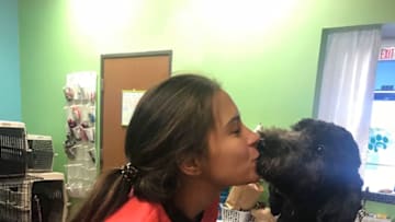 Groomer Marie Habecker of Pawsh, LLC and dog. Provided by Pawsh.