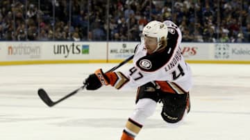 Oct 13, 2014; Buffalo, NY, USA; Anaheim Ducks defenseman Hampus Lindholm (47) takes a shot on goal against the Buffalo Sabres at First Niagara Center. Mandatory Credit: Timothy T. Ludwig-USA TODAY Sports