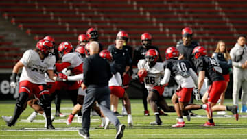 Cincinnati Bearcats running back Myles Montgomery runs ball during a spring practice at Nippert Stadium. The Enquirer.