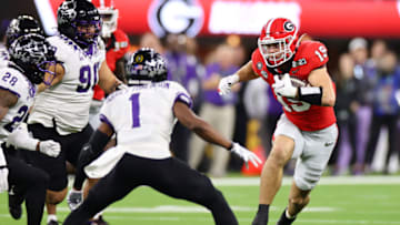 INGLEWOOD, CA - JANUARY 09: Brock Bowers #19 of the Georgia Bulldogs runs with the ball against the TCU Horned Frogs in the first half ofthe College Football Playoff National Championship held at SoFi Stadium on January 9, 2023 in Inglewood, California. (Photo by Jamie Schwaberow/Getty Images)