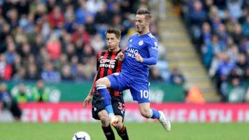 LEICESTER, ENGLAND - SEPTEMBER 22: James Maddison of Leicester City battles for possession with Eric Durm of Huddersfield Town during the Premier League match between Leicester City and Huddersfield Town at The King Power Stadium on September 22, 2018 in Leicester, United Kingdom. (Photo by Henry Browne/Getty Images)
