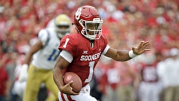NORMAN, OK - SEPTEMBER 08: Quarterback Kyler Murray #1 of the Oklahoma Sooners looks for a hole against the UCLA Bruins at Gaylord Family Oklahoma Memorial Stadium on September 8, 2018 in Norman, Oklahoma. The Sooners defeated the Bruins 49-21. (Photo by Brett Deering/Getty Images)