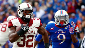 LAWRENCE, KS - OCTOBER 31: Running back Samaje Perine #32 of the Oklahoma Sooners carries the ball during the game against the Kansas Jayhawks at Memorial Stadium on October 31, 2015 in Lawrence, Kansas. (Photo by Jamie Squire/Getty Images)