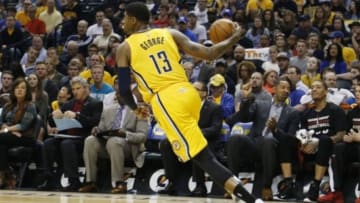 Apr 5, 2015; Indianapolis, IN, USA; Indiana Pacers forward Paul George (13) brings the ball up court against the Miami Heat at Bankers Life Fieldhouse. Mandatory Credit: Brian Spurlock-USA TODAY Sports