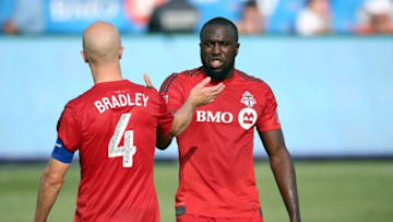 Aug 22, 2015; Toronto, Ontario, CAN; Toronto FC forward Jozy Altidore (17) celebrates their victory with midfielder Michael Bradley (4) against the Orlando City SC at BMO Field. Toronto FC beat Orlando City SC 5-0. Mandatory Credit: Tom Szczerbowski-USA TODAY Sports