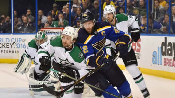 May 9, 2016; St. Louis, MO, USA; Dallas Stars defenseman Kris Russell (2) and St. Louis Blues center David Backes (42) battle for position on the Ice during the second period in game six of the second round of the 2016 Stanley Cup Playoffs at Scottrade Center. Mandatory Credit: Jasen Vinlove-USA TODAY Sports