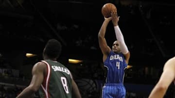 Jan 31, 2014; Orlando, FL, USA; Orlando Magic shooting guard Arron Afflalo (4) shoots the ball against the Milwaukee Bucks during the second half at Amway Center. Orlando Magic won 113-102. Mandatory Credit: Kim Klement-USA TODAY Sports