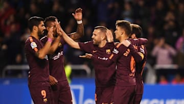 LA CORUNA, SPAIN - APRIL 29: Lionel Messi of Barcelona (obscured right) celebrates as he scores his sides fourth goal with team mates during the La Liga match between Deportivo La Coruna and Barcelona at Estadio Riazor on April 29, 2018 in La Coruna, Spain. (Photo by David Ramos/Getty Images)