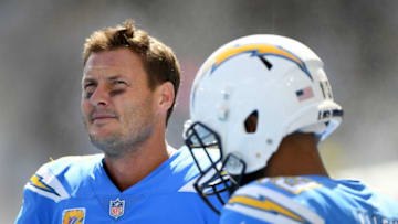 CARSON, CA - OCTOBER 07: Philip Rivers #17 and Keenan Allen #13 of the Los Angeles Chargers on the sidelines before the game against the Oakland Raiders at StubHub Center on October 7, 2018 in Carson, California. (Photo by Harry How/Getty Images)