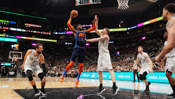 SAN ANTONIO, TX - MARCH 2: Nerlens Noel #3 of the Oklahoma City Thunder drives through the paint during the game against Jakob Poeltl #25 of the San Antonio Spurs on March 2, 2019 at the AT&T Center in San Antonio, Texas. NOTE TO USER: User expressly acknowledges and agrees that, by downloading and or using this photograph, user is consenting to the terms and conditions of the Getty Images License Agreement. Mandatory Copyright Notice: Copyright 2019 NBAE (Photos by Darren Carroll/NBAE via Getty Images)