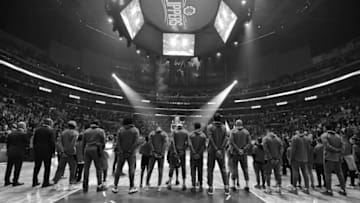 LOS ANGELES, CA - JANUARY 31: The LA Clippers stand for the National Anthem before the game against the Los Angeles Lakers on January 31, 2019 at STAPLES Center in Los Angeles, California. NOTE TO USER: User expressly acknowledges and agrees that, by downloading and/or using this Photograph, user is consenting to the terms and conditions of the Getty Images License Agreement. Mandatory Copyright Notice: Copyright 2019 NBAE (Photo by Adam Pantozzi/NBAE via Getty Images) (EDITORS NOTE this image has been converted to black and white)
