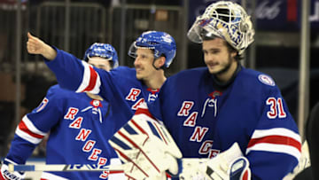 NEW YORK, NEW YORK - MAY 24: Ryan Strome #16 and Igor Shesterkin #31 of the New York Rangers celebrate their 4-1 victory over the Carolina Hurricanes in Game Four of the Second Round of the 2022 Stanley Cup Playoffs at Madison Square Garden on May 24, 2022 in New York City. (Photo by Bruce Bennett/Getty Images)